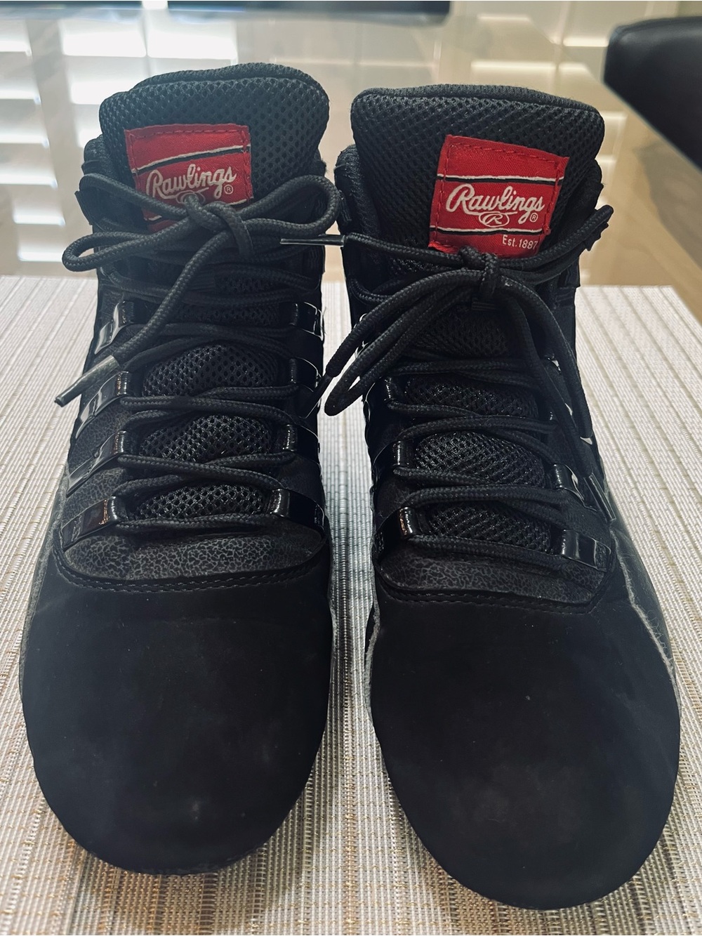 SZ 6 (big boy)Rawlings Black High-Top Cleats with Red Logo Patch